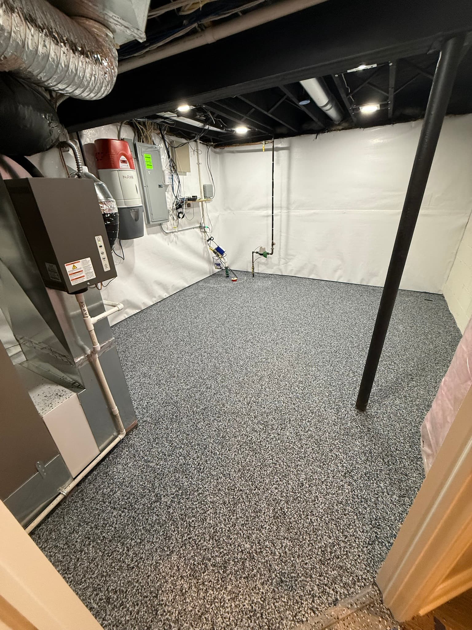 Coated basement utility room floor