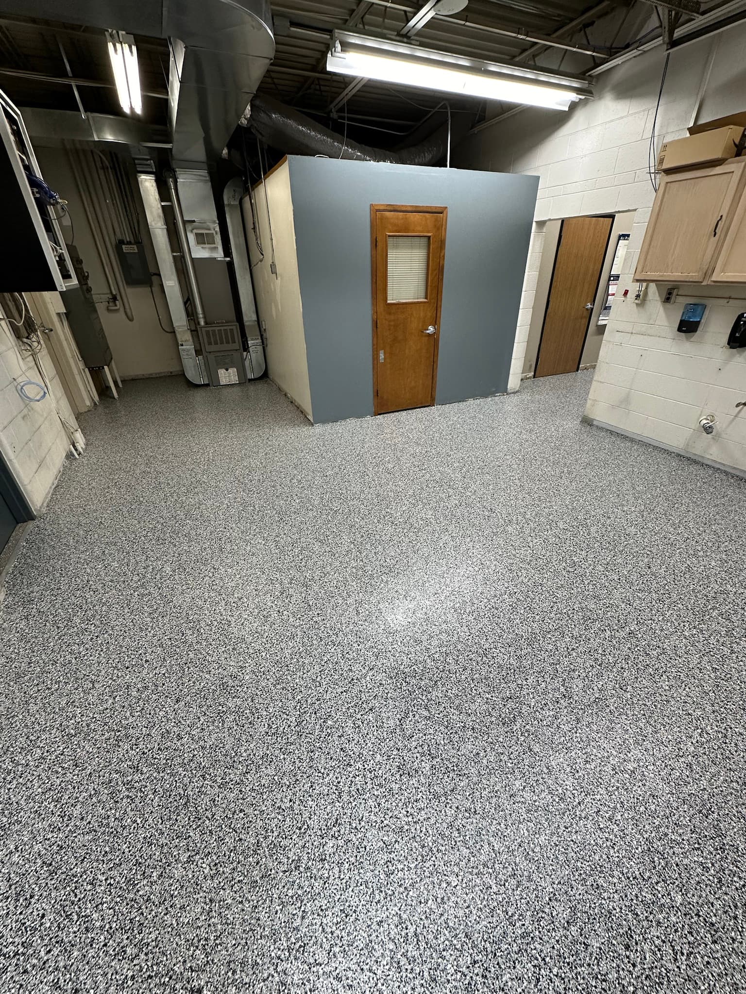 Coated mechanical room floor