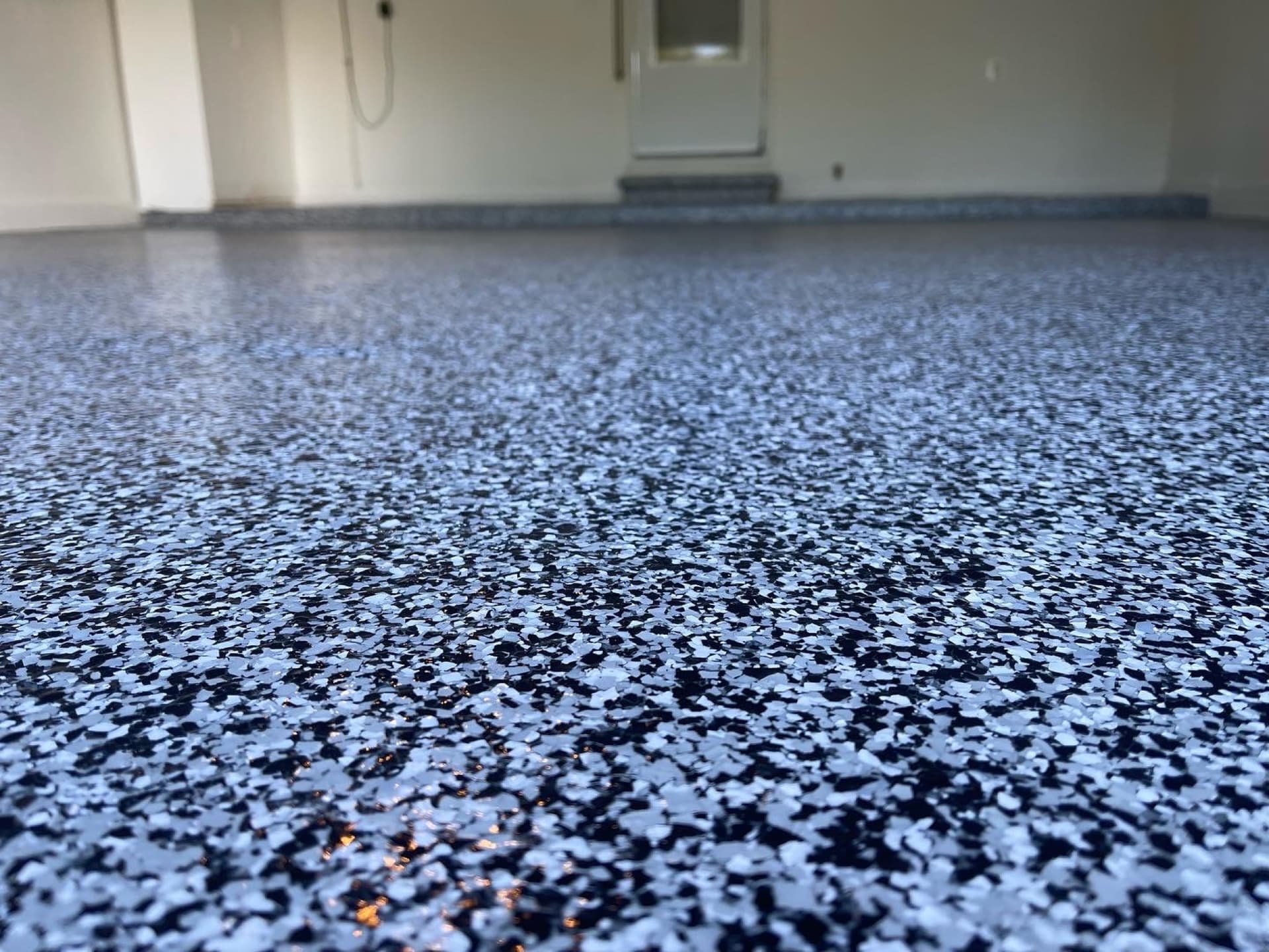Grey flake garage floor from a low angle