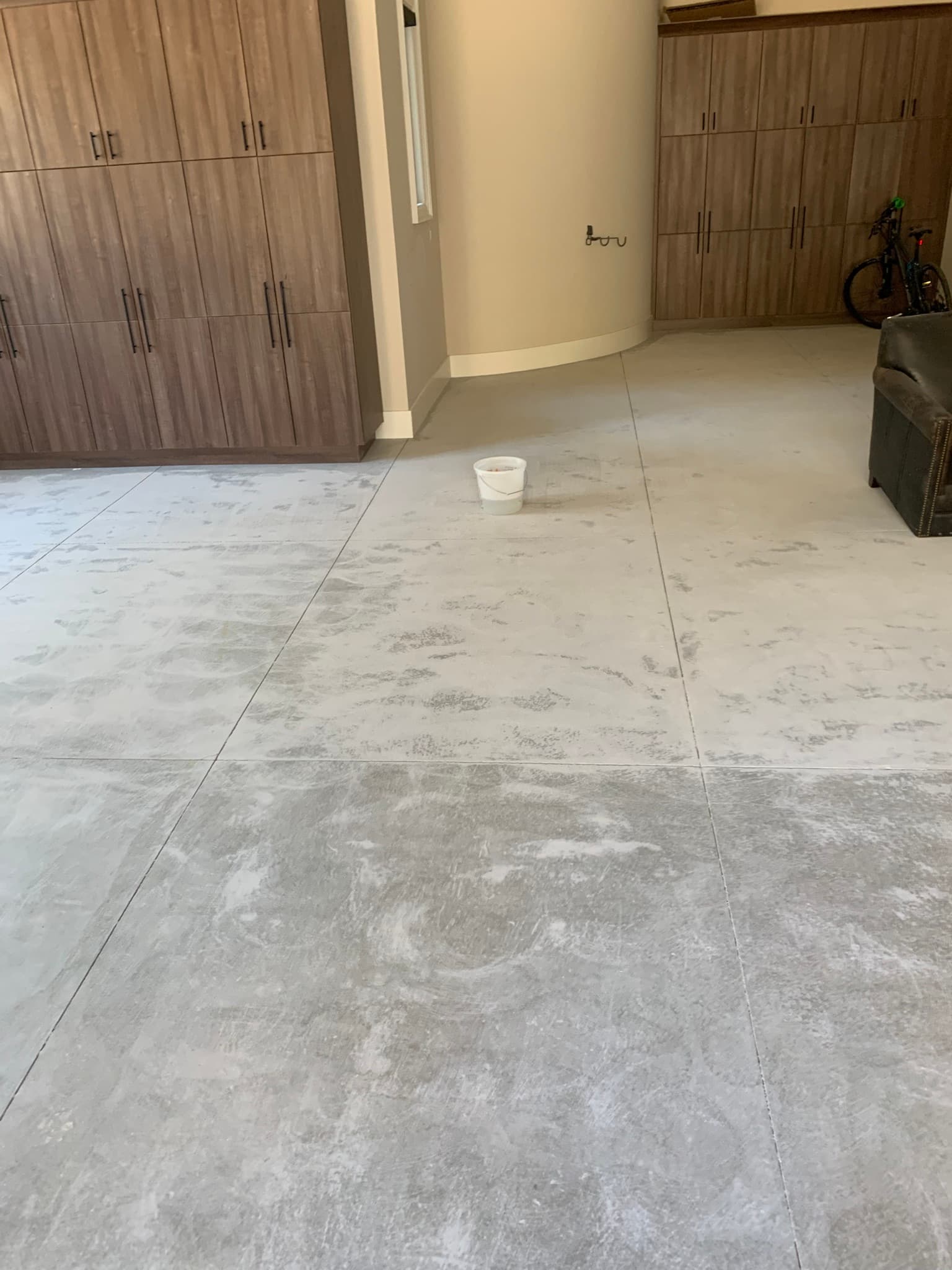 Raw concrete garage floor before coating