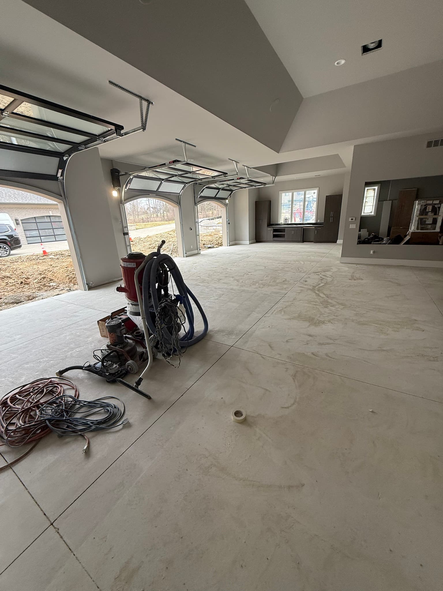 Three-car garage prepped for coating