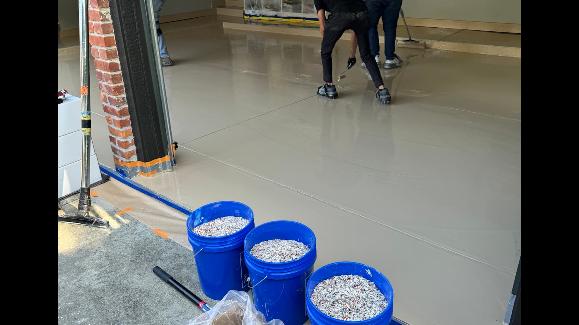 Reserve Coatings installer profiling a concrete garage floor