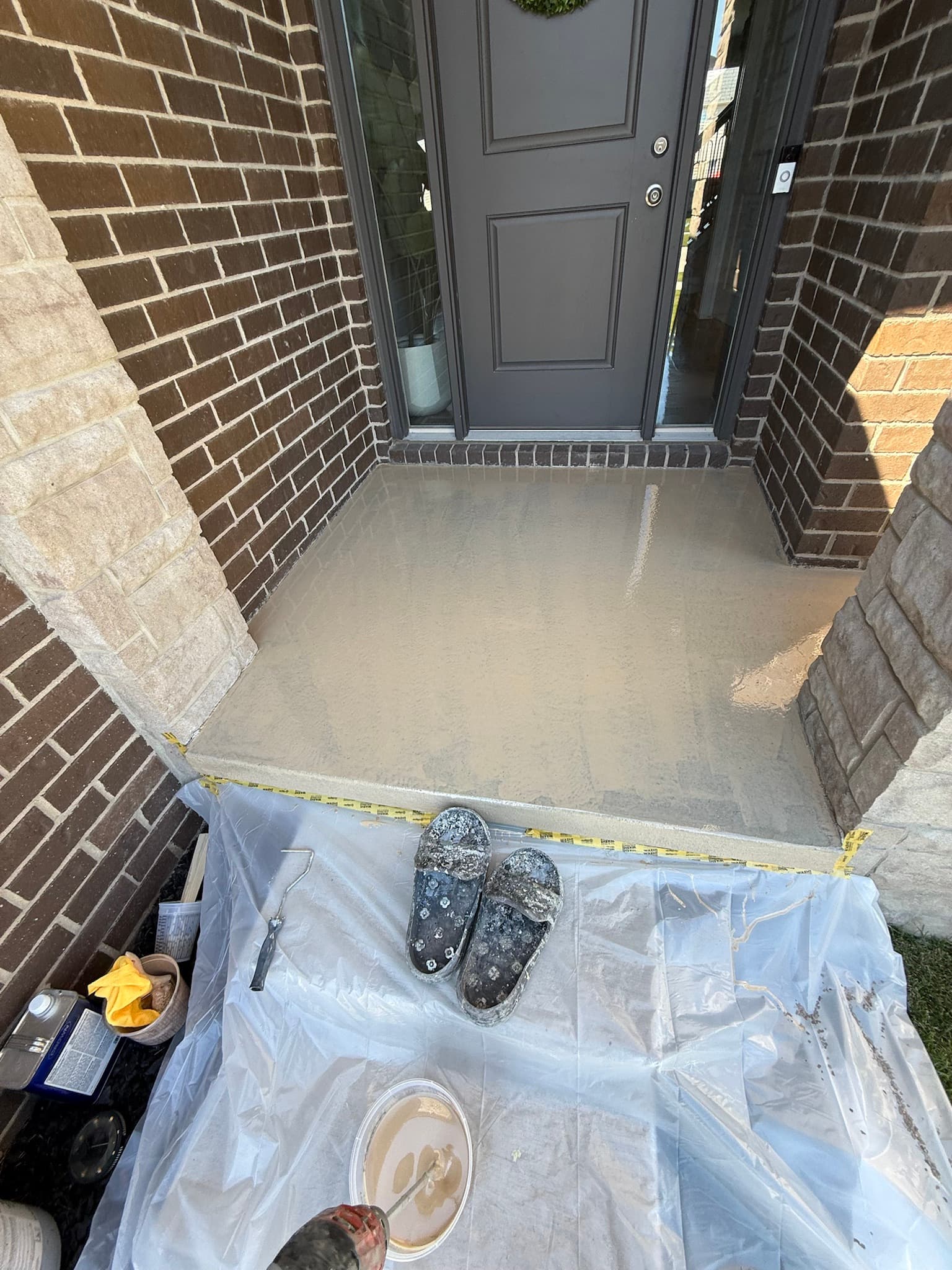 Porch floor coating in progress