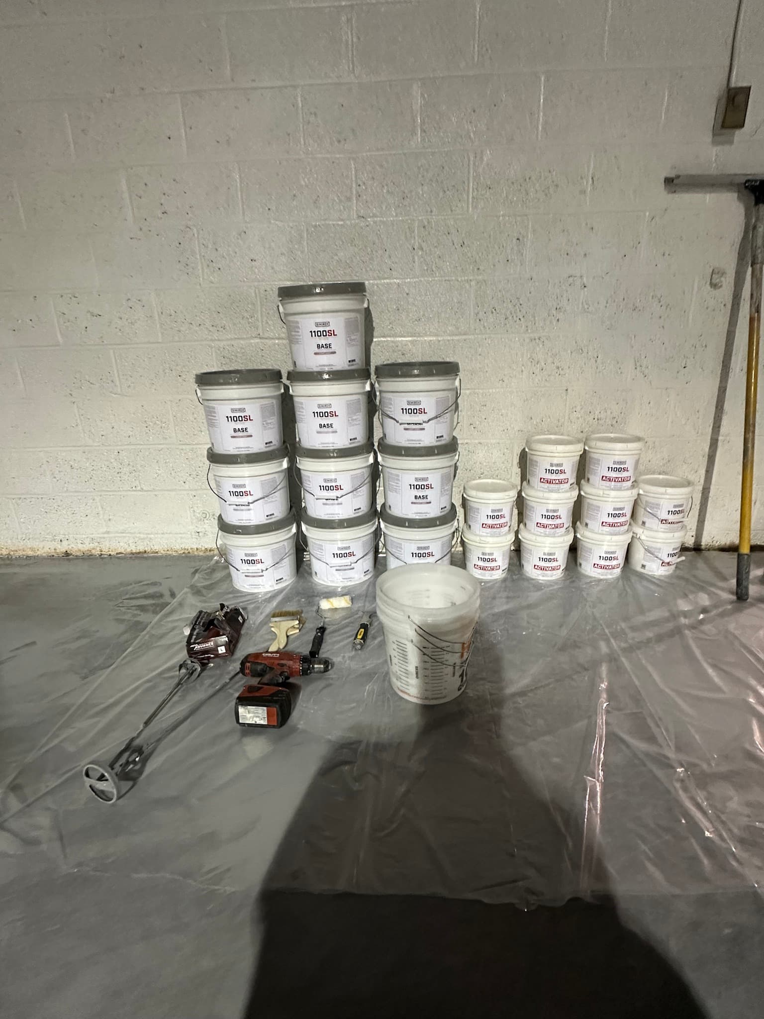 Simiron 1100SL polyurea base and activator staged on site